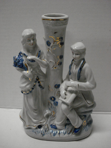 Porselein beeld Man en vrouw bij zuil blauw / wit
