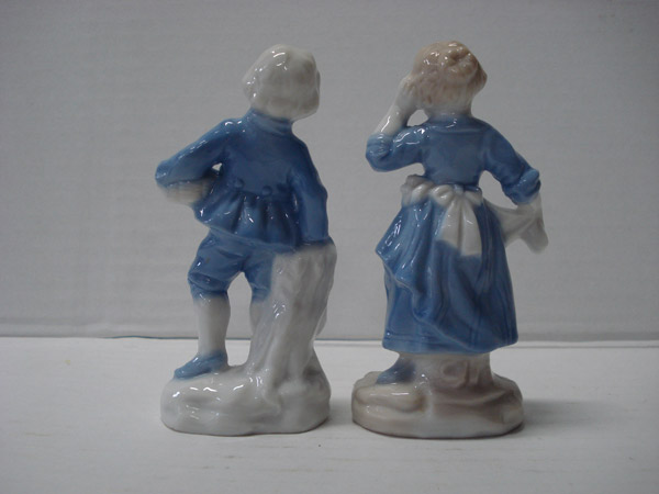 Porseleinen beeldjes Man en vrouw met fruit