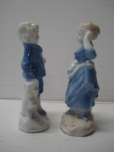 Porseleinen beeldjes Man en vrouw met fruit