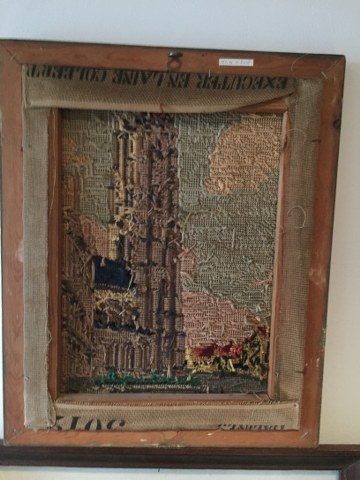 Huizen en toren geborduurd